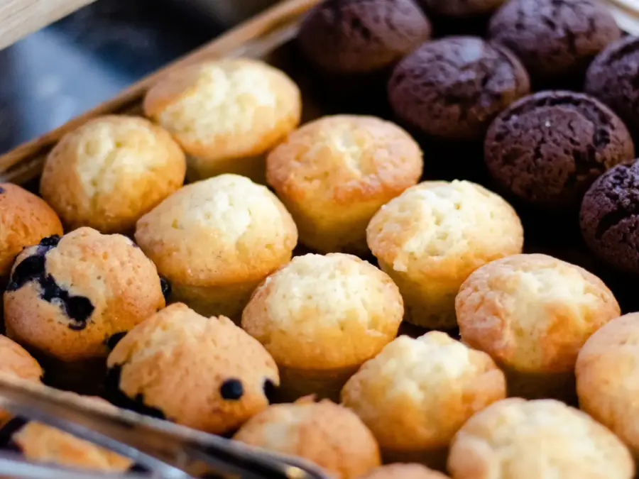 Trays of mini vanilla and chocolate muffins